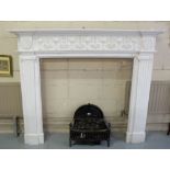 White Marble Fireplace, with decorative Adams frieze, each side jam carved with doric columns, 78”