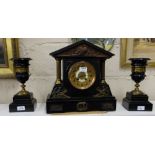 3 Piece Black Marble Clock Set incl. a mantle clock with doric brass columns, the brass dial stamped