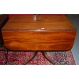 Edwardian Mahogany Pembroke Table, with an apron drawer and drop leaves, on a pedestal base with 4