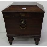 Regency Mahogany Wine Cooler, with brass lions head finial, on turned feet, the interior with