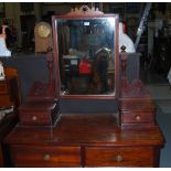 Walnut Dressing Table with a swivel mirror back over 5 drawers and 2 gallery drawers, 42”w