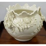 1st Period Belleek Jardinere, heavily decorated with raised flowers and birds (bird wings