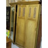 Large Edwardian Walnut 3 Door Wardrobe - 1 with mirrored glass, 2 with carved panels, enclosing