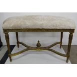Carved and Gilded Bedroom Stool/Window Seat, with grey fabric covered and padded seat, 42”w