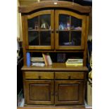 Oak Display Cabinet, two glass doors over two drawers and two cabinets, 44”w x 73”h