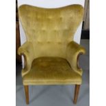 Wingback Armchair, on tapered mahogany legs, beige fabric