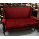 Mahogany framed 3 seater settee with carved top rail and sabre front legs, 56"w x 45"h x 28"d