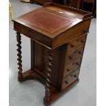 19thC Rosewood Davenport, the red leather writing slope over barley twist supports, drawers to one
