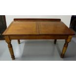 Victorian Mahogany Clerks Desk, on turned legs, the hinged and sloped top opening to an inner