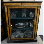 19thC Walnut Pier Cabinet, inlaid with ebony, gilt mounts and platform base, the single glass door