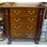 Compact mahogany chest of (4) drawers, with drop brass handles and ribbed side panels on 2 hairy paw