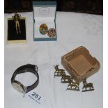 5 items – two similar floral Italian brooches, Swiss sports watch (not working), set of 4 brass goat