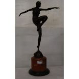 Art Deco Bronze Figure of a Dancer, on a circular red marble base, 21”h