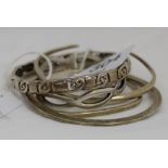 5 Lady’s silver bangles, including 2 cuffs (5)