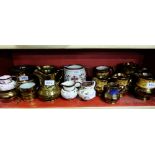Shelf of brown lustre ware – jugs, teapot, cups etc
