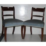 Matching Pair of Mahogany Dining Chairs with blue padded seats, sabre front legs