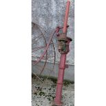 Hand Operated Water Pump, by Bamford, painted red