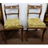 Matching Pair of Edwardian Mahogany Sabre Leg Dining Chairs with bergere seats and padded cushions