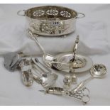 Oval shaped plated pierced tureen with contents (plated cutlery, grape scissors etc)