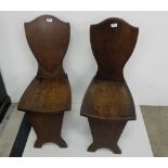 Matching Pair of early Georgian mahogany Hall Chairs with shield shaped backs