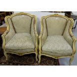 Matching Pair of French Cream Painted Armchairs, with worn green silk covered backs and cushions