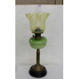 Victorian Oil Lamp, a green tulip shaped shade over a green bowl and brass base