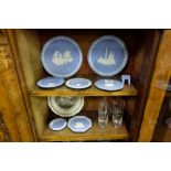 Selection of 7 Wedgewood blue and white plates, including 5 trinket dishes and larger Christmas