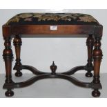 Mahogany Dressing/Window Stool, with s-shaped stretcher, turned legs, needlepoint covered seat, 23”w