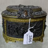 19thC French Spelter oval-shaped Caddy, with brass mounts and hinged lid, decorated in relief with