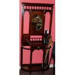 Mahogany Hallstand, with oval mirror and red tile inserts, 22”w x 73”h
