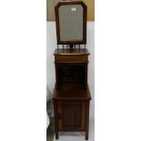 Narrow Gents Mahogany Washstand with swivel mirror over a lidded compartment and single door