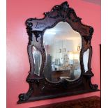 Mahogany Framed Overmantle, with a serpentine shaped top, over ornate fretwork and carvings, 3