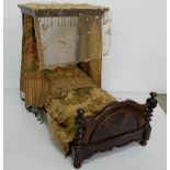 Miniature Mahogany Half Tester Doll’s Bed, with brocade curtains and matching bed clothes, 25”long