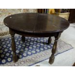 Circular Walnut Dining Table (extendable with leaves below), on round and square feet, 47” dia