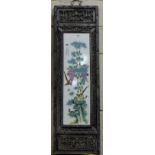 Chinese Teak Wall Hanging with central porcelain insert featuring birds, fretwork borders, 45” x