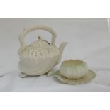 1st Period Belleek Teapot on seashell & an early Belleek sugar bowl and saucer (3) (small chips on