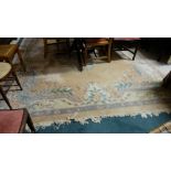 Wool peach ground rug, floral pattern, 3.5 x 2.75