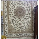 Ivory ground Floor Rug with a sharbas medallion design, 1.55m x 2.4m (as new)
