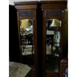 Two mirrored wardrobes with pediments and bevelled glass, each 19”w