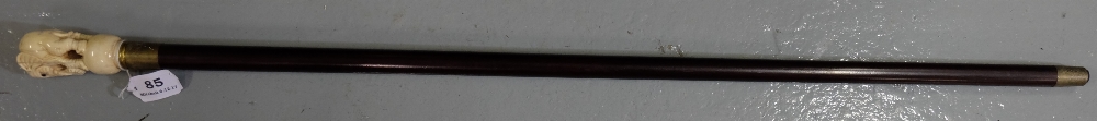 Turned Mahogany Walking Cane with an elephant shaped bone handle