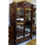 French Kingwood Wardrobe, with 2 mirrored doors and turned columns, lion mask, on turned feet,