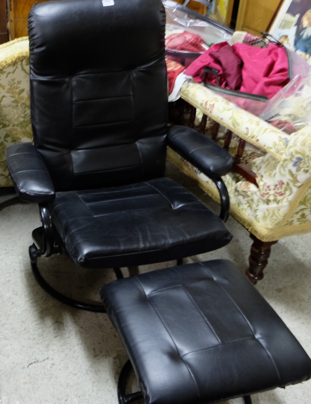 Reclining Armchair with matching stool, covered with black leatherette