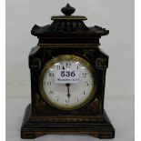 Mantle Clock in a black Japanned Case (wind-up movement), white dial, in the shape of a pagoda, 9”h