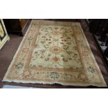 Afghan Ziegler Floor Rug, cream ground with red and green designs 2.60m x 1.80
