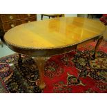 Extendable Oval End Mahogany Dining Table, with fluted borders, on ball and claw feet, 48”w x