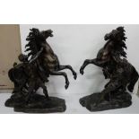 Matching Pair of 19thC Bronze Marli Horses with handlers, on a natural base, each 22”h (1 reins