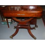 Regency Mahogany Fold over Tea Table, polished, with brass escutcheon, over boat shaped support