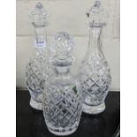 Pair of Waterford Crystal Decanters with stoppers and another single cut crystal decanter with