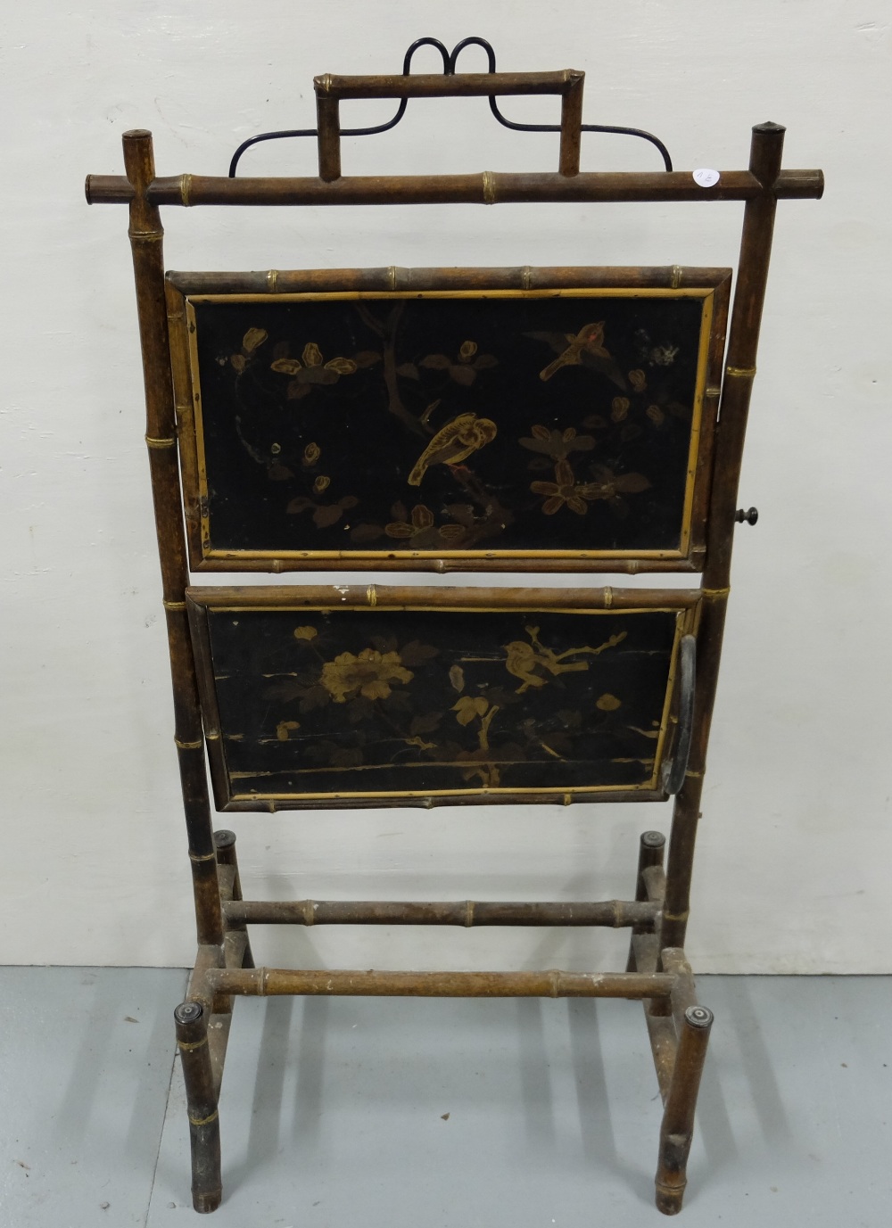 Victorian Bamboo Framed and Chinese Lacquered Covered Fire Screen with a folding shelf, 19”w x 40”h