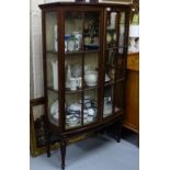 Bowfront Mahogany Display Cabinet, with 2 internal shelves, on turned and reeded legs, 38”w x 63”h